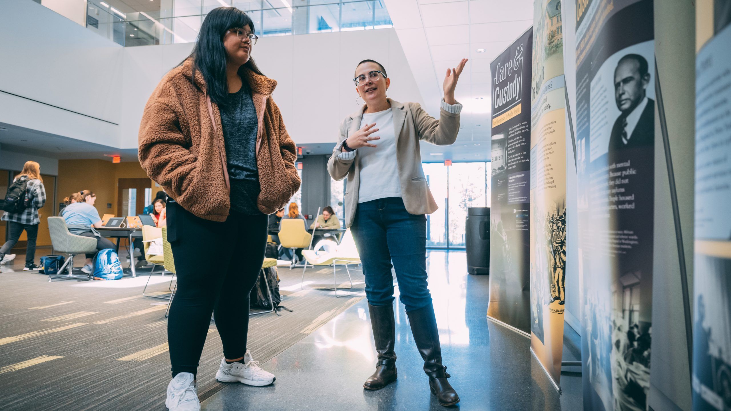 Parsons with student at Traveling exhibit