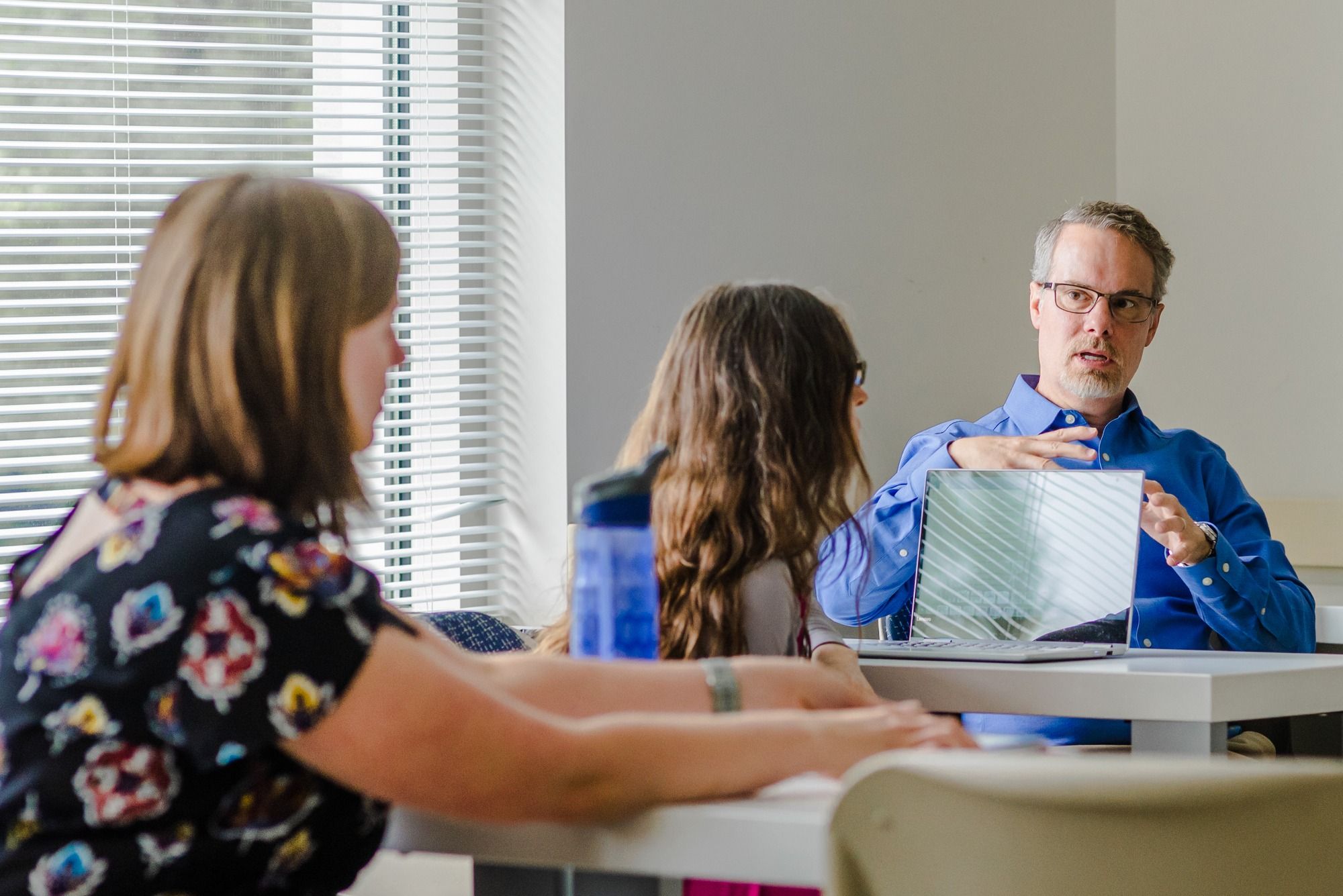 David Wyrick speaking with students